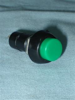 Interruptor de botão verde